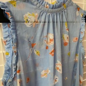 Sheer Who What Wear blue floral blouse with high neck and ruffle sleeves